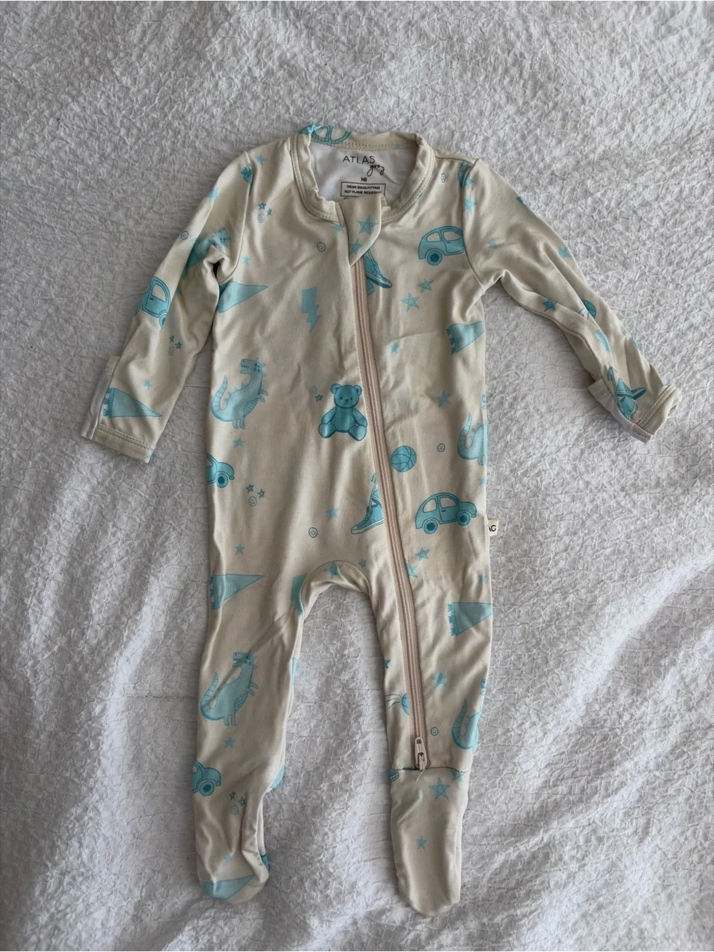Cream Footed One-Piece with Light Blue Toy & Vehicle Motif
